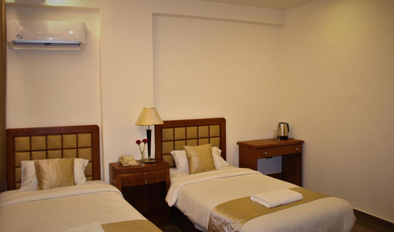 New Merryland Hotel Амман Экстерьер фото